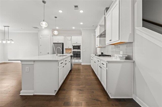 240 Walker Ave, Roswell, GA 30076 - kitchen with a sink, stainless steel appliances, ornamental molding, decorative backsplash, and recessed lighting