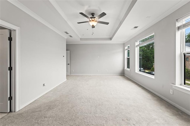 240 Walker Ave, Roswell, GA 30076 - spare room featuring a tray ceiling, a ceiling fan, light colored carpet, and baseboards