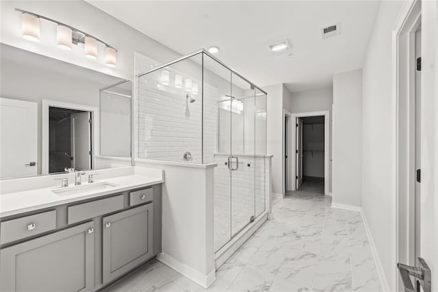 240 Walker Ave, Roswell, GA 30076 - bathroom with marble look tiles, baseboards, vanity, and a stall shower