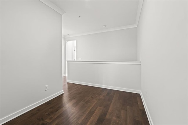 240 Walker Ave, Roswell, GA 30076 - spare room featuring crown molding, baseboards, and wood-type flooring