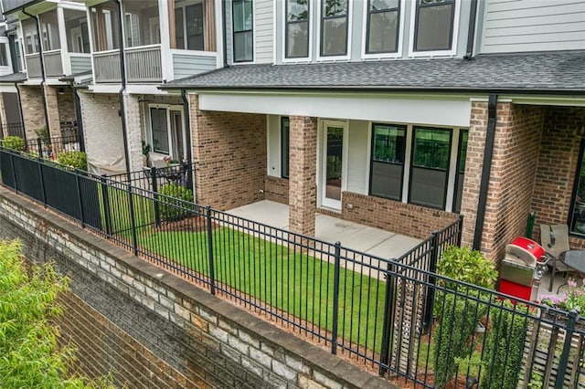 240 Walker Ave, Roswell, GA 30076 - property entrance featuring brick siding and a shingled roof