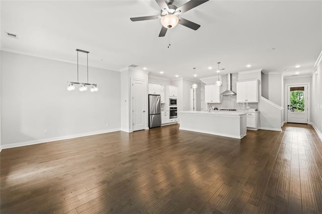 240 Walker Ave, Roswell, GA 30076 - unfurnished living room with ornamental molding, a ceiling fan, dark wood finished floors, recessed lighting, and baseboards
