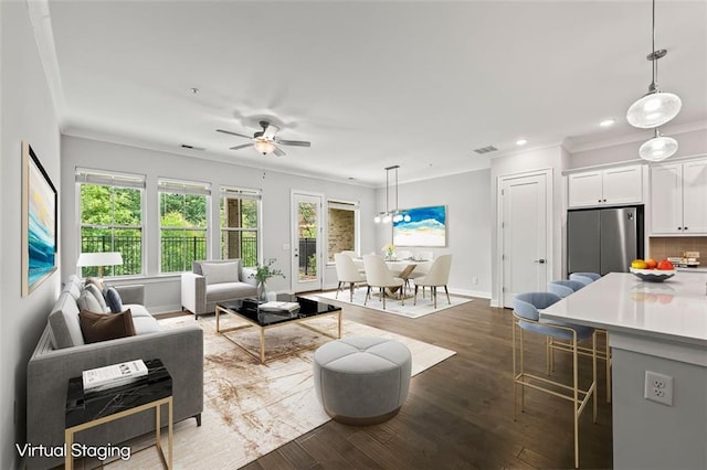 240 Walker Ave, Roswell, GA 30076 - living area with crown molding, dark wood finished floors, recessed lighting, a ceiling fan, and baseboards