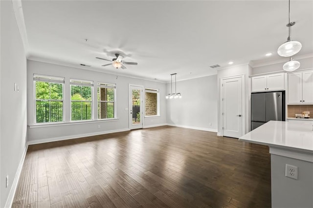 240 Walker Ave, Roswell, GA 30076 - unfurnished living room featuring ornamental molding, a ceiling fan, baseboards, dark wood-type flooring, and recessed lighting