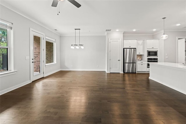 240 Walker Ave, Roswell, GA 30076 - unfurnished living room featuring ceiling fan, ornamental molding, dark wood-type flooring, baseboards, and recessed lighting