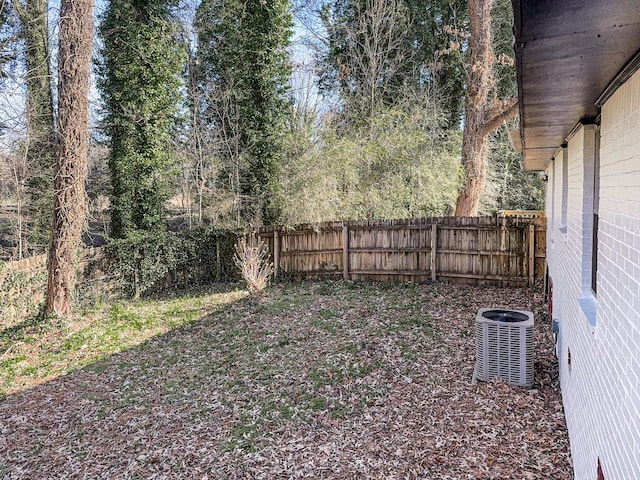 view of yard with central AC unit