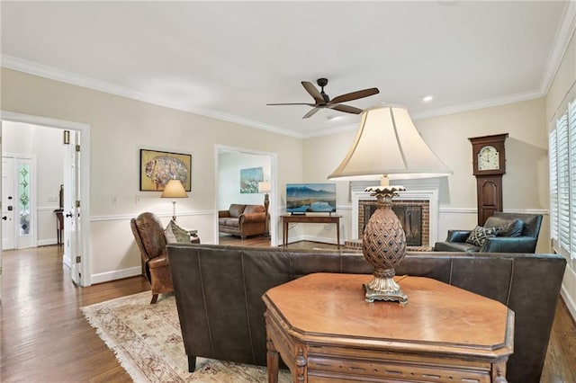 2819 Saddlebrook Way NW, Marietta, GA 30064 - living area with wood finished floors, ceiling fan, ornamental molding, baseboards, and a fireplace