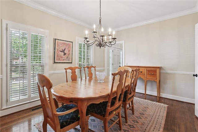 2819 Saddlebrook Way NW, Marietta, GA 30064 - dining room with a chandelier, wood finished floors, crown molding, and baseboards