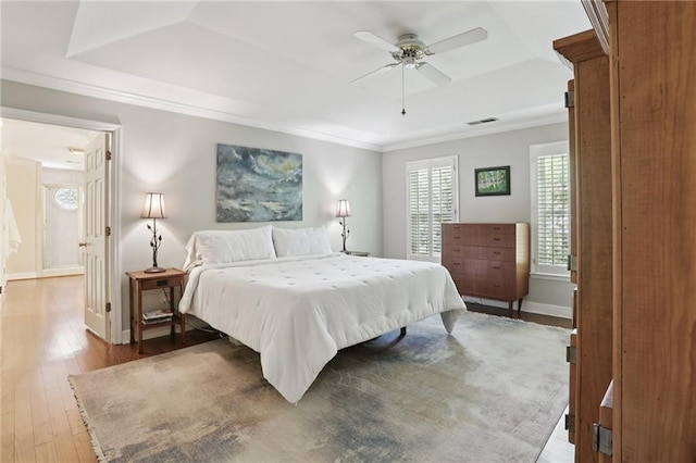 2819 Saddlebrook Way NW, Marietta, GA 30064 - bedroom featuring a tray ceiling, wood-type flooring, crown molding, baseboards, and a ceiling fan