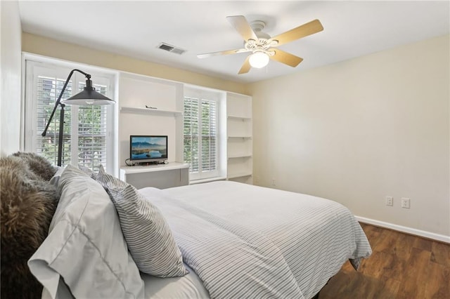 2819 Saddlebrook Way NW, Marietta, GA 30064 - bedroom with wood finished floors, baseboards, and ceiling fan