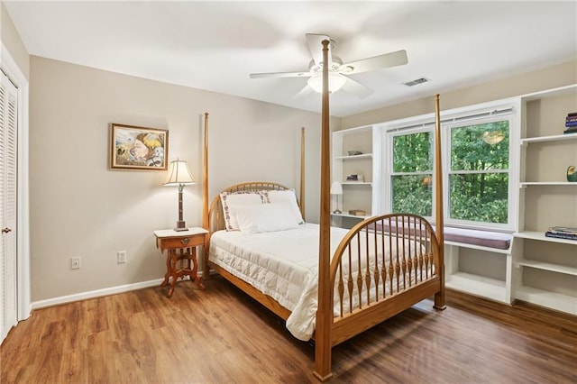2819 Saddlebrook Way NW, Marietta, GA 30064 - bedroom featuring wood finished floors, baseboards, and ceiling fan