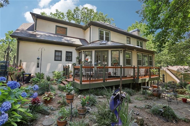 2819 Saddlebrook Way NW, Marietta, GA 30064 - rear view of house featuring stucco siding, a deck, and a chimney