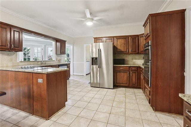 2819 Saddlebrook Way NW, Marietta, GA 30064 - kitchen featuring appliances with stainless steel finishes, ceiling fan, tasteful backsplash, light tile patterned floors, and ornamental molding
