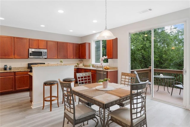 6018 Oakdale Rd SE, Mableton, GA 30126 - dining area featuring light wood-style floors and recessed lighting