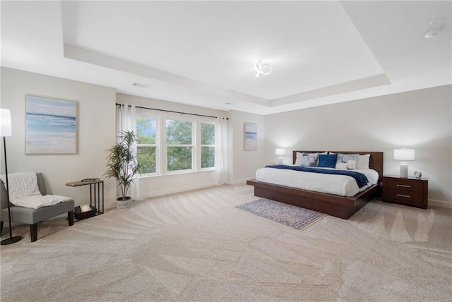 6018 Oakdale Rd SE, Mableton, GA 30126 - bedroom featuring a raised ceiling and carpet