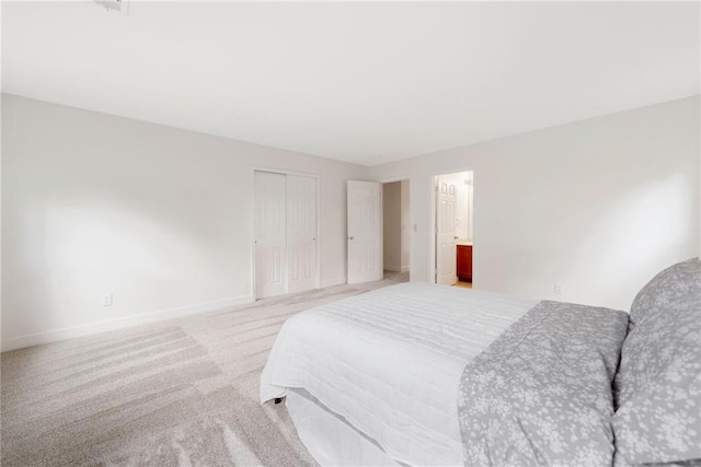 6018 Oakdale Rd SE, Mableton, GA 30126 - bedroom featuring light carpet and a closet