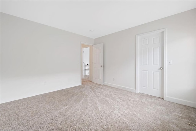 6018 Oakdale Rd SE, Mableton, GA 30126 - empty room featuring carpet floors and baseboards