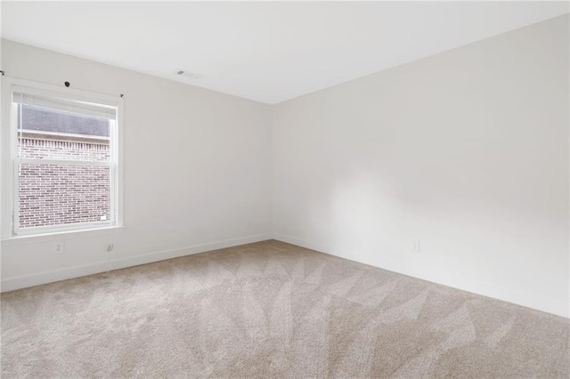 6018 Oakdale Rd SE, Mableton, GA 30126 - carpeted empty room with baseboards