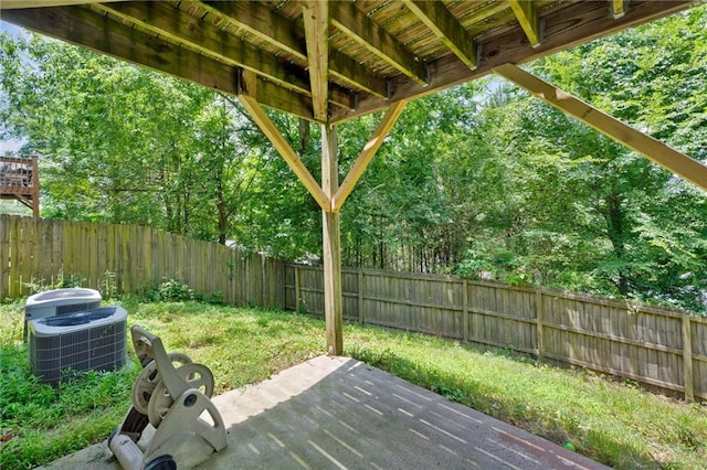 6018 Oakdale Rd SE, Mableton, GA 30126 - wooden terrace with a fenced backyard and a patio area
