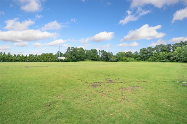 6018 Oakdale Rd SE, Mableton, GA 30126 - view of green lawn featuring view of scattered trees