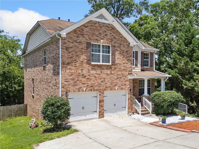 6018 Oakdale Rd SE, Mableton, GA 30126 - view of front facade featuring concrete driveway, a garage, and brick siding