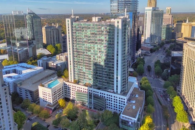 birds eye view of property featuring a city view