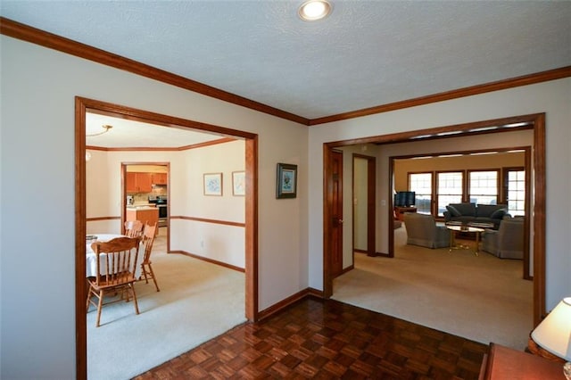 118 Heritage Way, Peachtree City, GA 30269 - corridor with dark colored carpet, baseboards, crown molding, and a textured ceiling