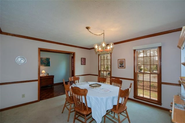 118 Heritage Way, Peachtree City, GA 30269 - carpeted dining space with a chandelier, baseboards, and crown molding
