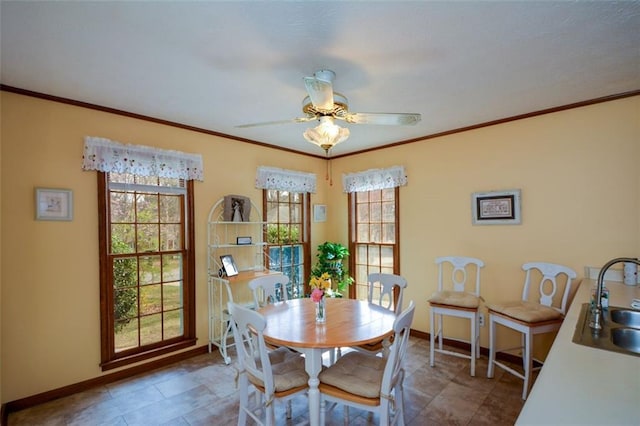 118 Heritage Way, Peachtree City, GA 30269 - dining space featuring healthy amount of natural light, baseboards, a ceiling fan, and crown molding