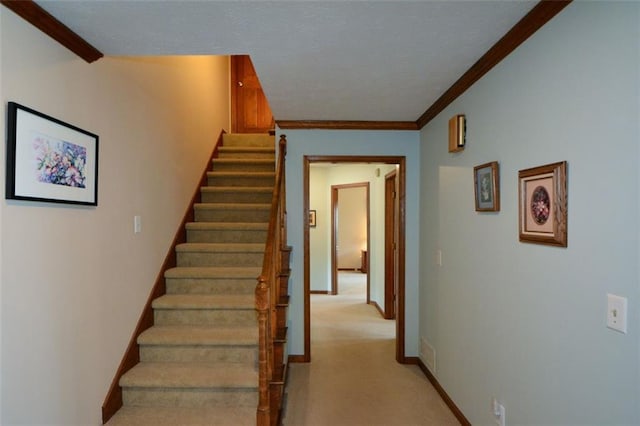118 Heritage Way, Peachtree City, GA 30269 - staircase with carpet floors, ornamental molding, baseboards, and a textured ceiling
