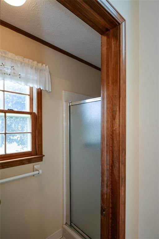 118 Heritage Way, Peachtree City, GA 30269 - full bath featuring a shower stall, crown molding, and baseboards