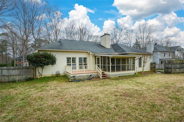 118 Heritage Way, Peachtree City, GA 30269 - rear view of house featuring a sunroom, a chimney, and a wooden deck