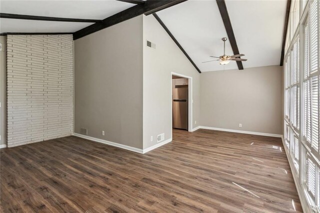 hallway featuring a sink, baseboards, and wood finished floors