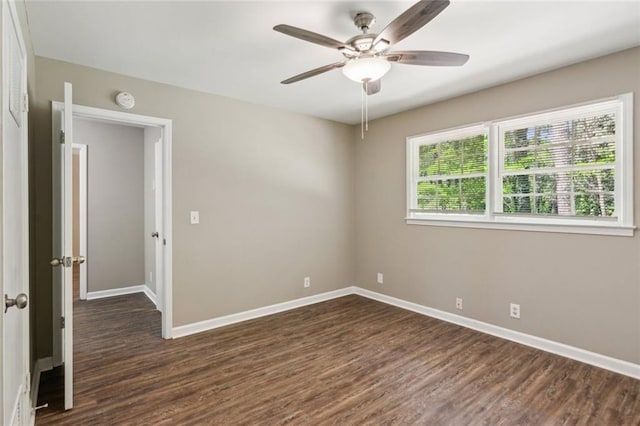 unfurnished bedroom featuring visible vents, baseboards, and wood finished floors