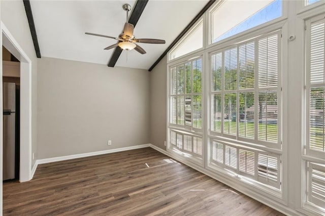 unfurnished room featuring baseboards, a ceiling fan, and dark wood-style flooring