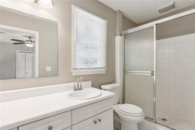 bathroom with tile patterned flooring, washtub / shower combination, toilet, and vanity