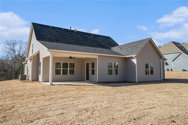 rear view of property featuring cooling unit, ceiling fan, and a patio area