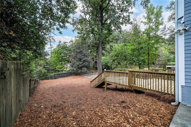 view of yard with a deck