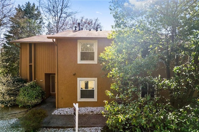 exterior space featuring stucco siding