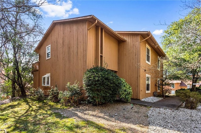 view of property exterior with a patio