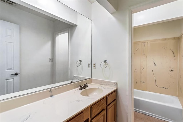 bathroom with visible vents and vanity