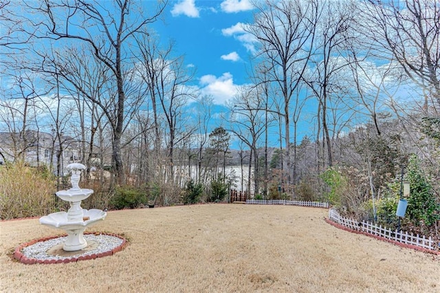 view of yard featuring fence