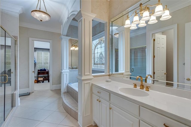 bathroom featuring a chandelier, a shower stall, a wealth of natural light, and ornate columns