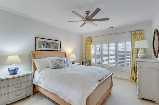bedroom featuring a ceiling fan, light carpet, ornamental molding, and visible vents