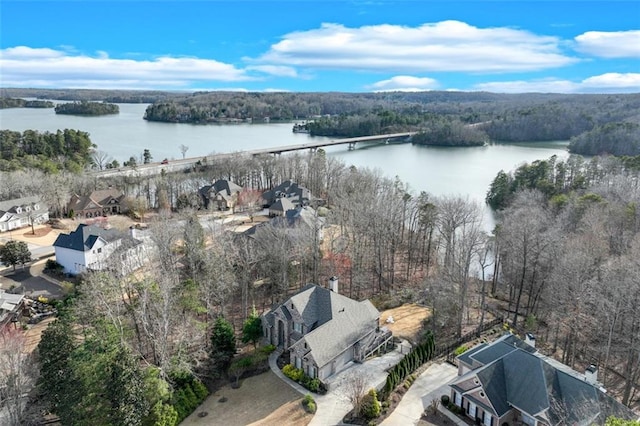 bird's eye view with a forest view, a residential view, and a water view
