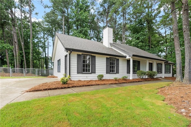 40 Melton Way, Covington, GA 30016 - single story home with a chimney, concrete driveway, and a shingled roof
