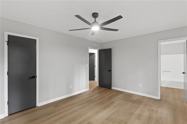 40 Melton Way, Covington, GA 30016 - unfurnished bedroom with light wood-type flooring and ceiling fan
