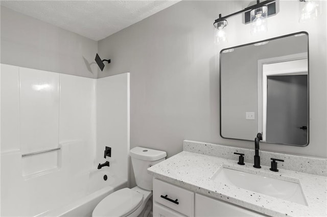 40 Melton Way, Covington, GA 30016 - bathroom with vanity, tub / shower combination, and a textured ceiling