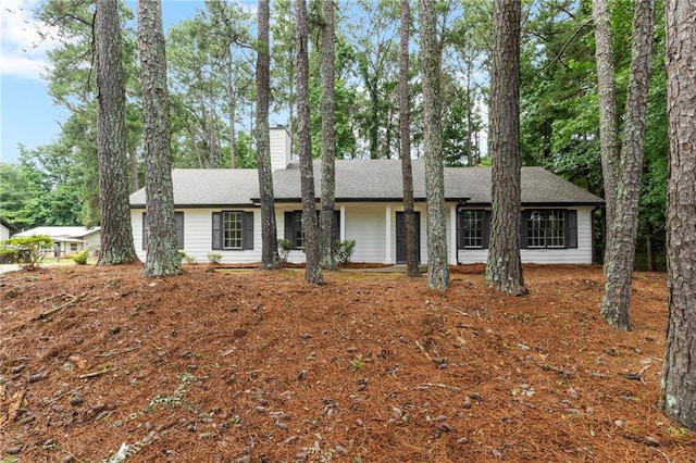 40 Melton Way, Covington, GA 30016 - view of front of house featuring a chimney and roof with shingles