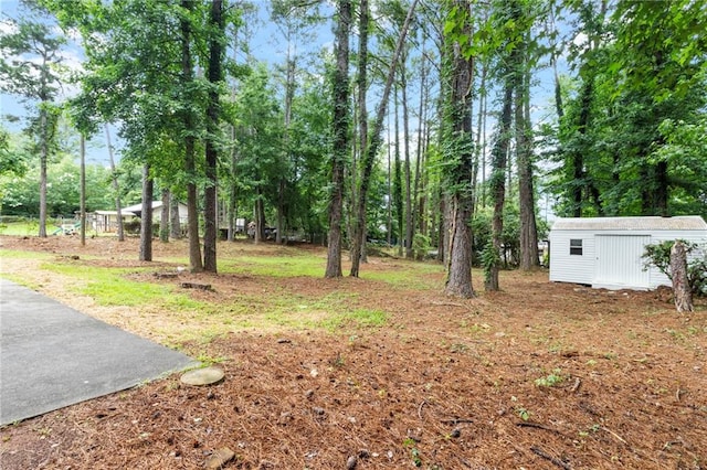 40 Melton Way, Covington, GA 30016 - view of yard with a storage unit